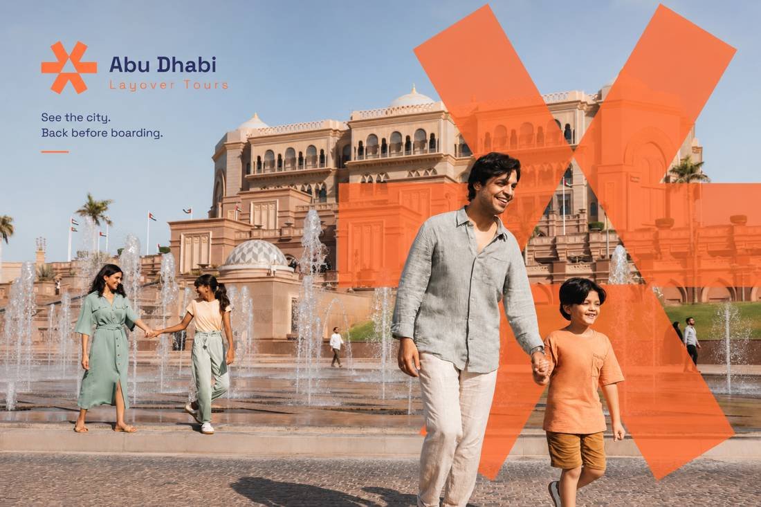 Family at Emirates Palace fountains on an Abu Dhabi layover tour